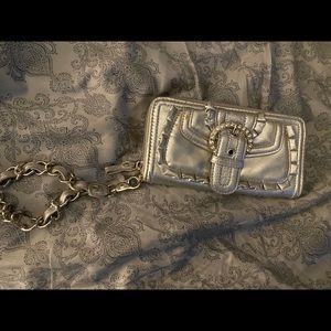 Silver wristlet, used but still has life.